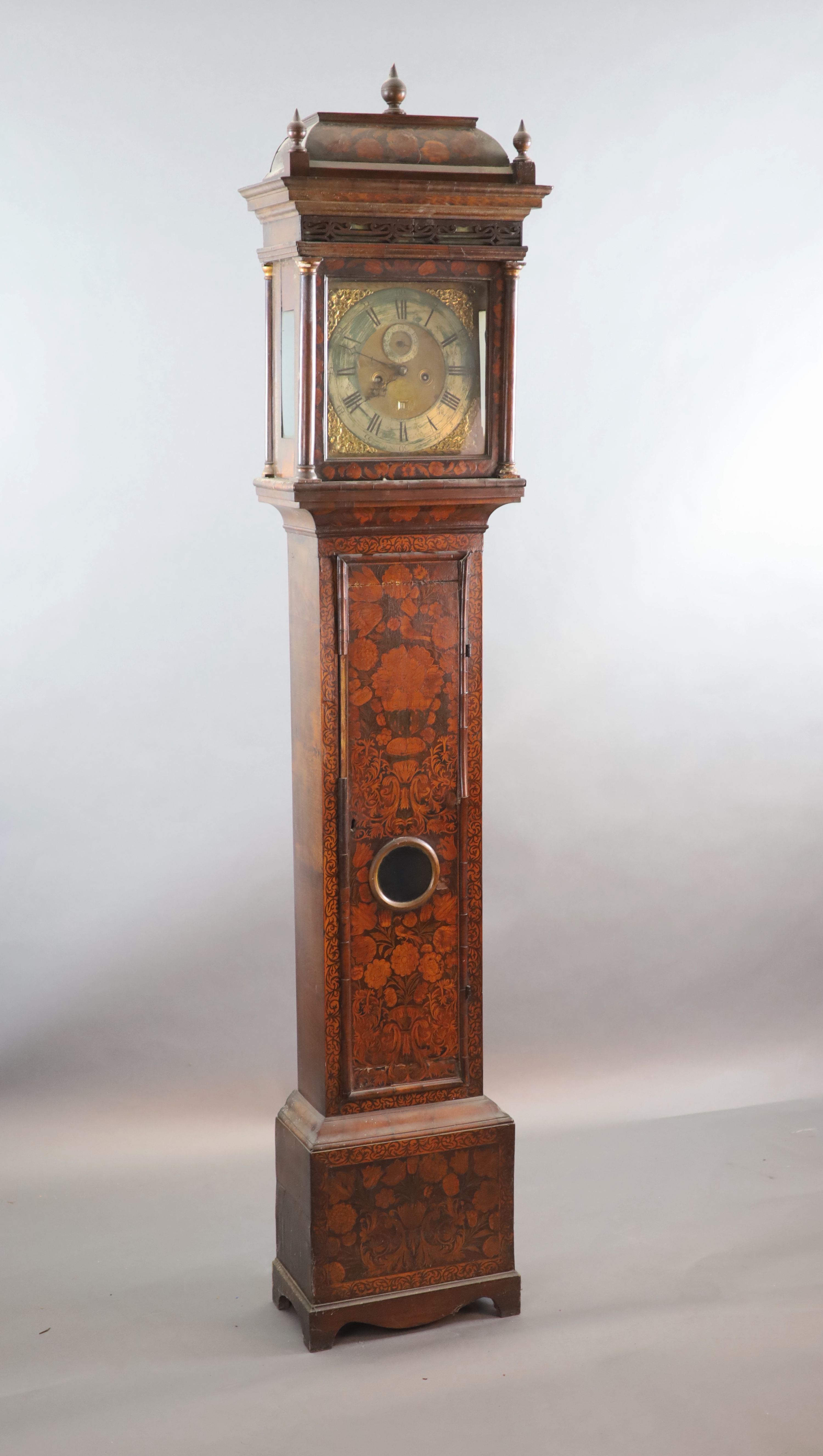 An early 18th century walnut and floral marquetry longcase clock